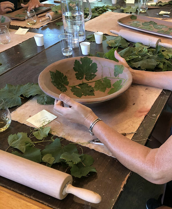 Hawkmoth Arts Class Schedule, Clay bowl with pressed leaves on the inside.